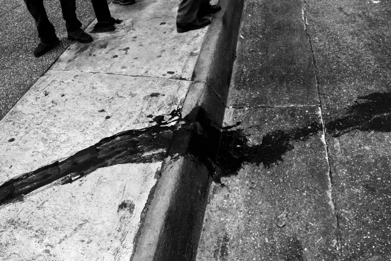 Blood on the streets of Caracas after Chavez's supporters shot into a crowd of an opposition rally, killing one and wounding several. Caracas, Venezuela. 2004 © Christopher Anderson, Album: Christopher Anderson, Capitolio
